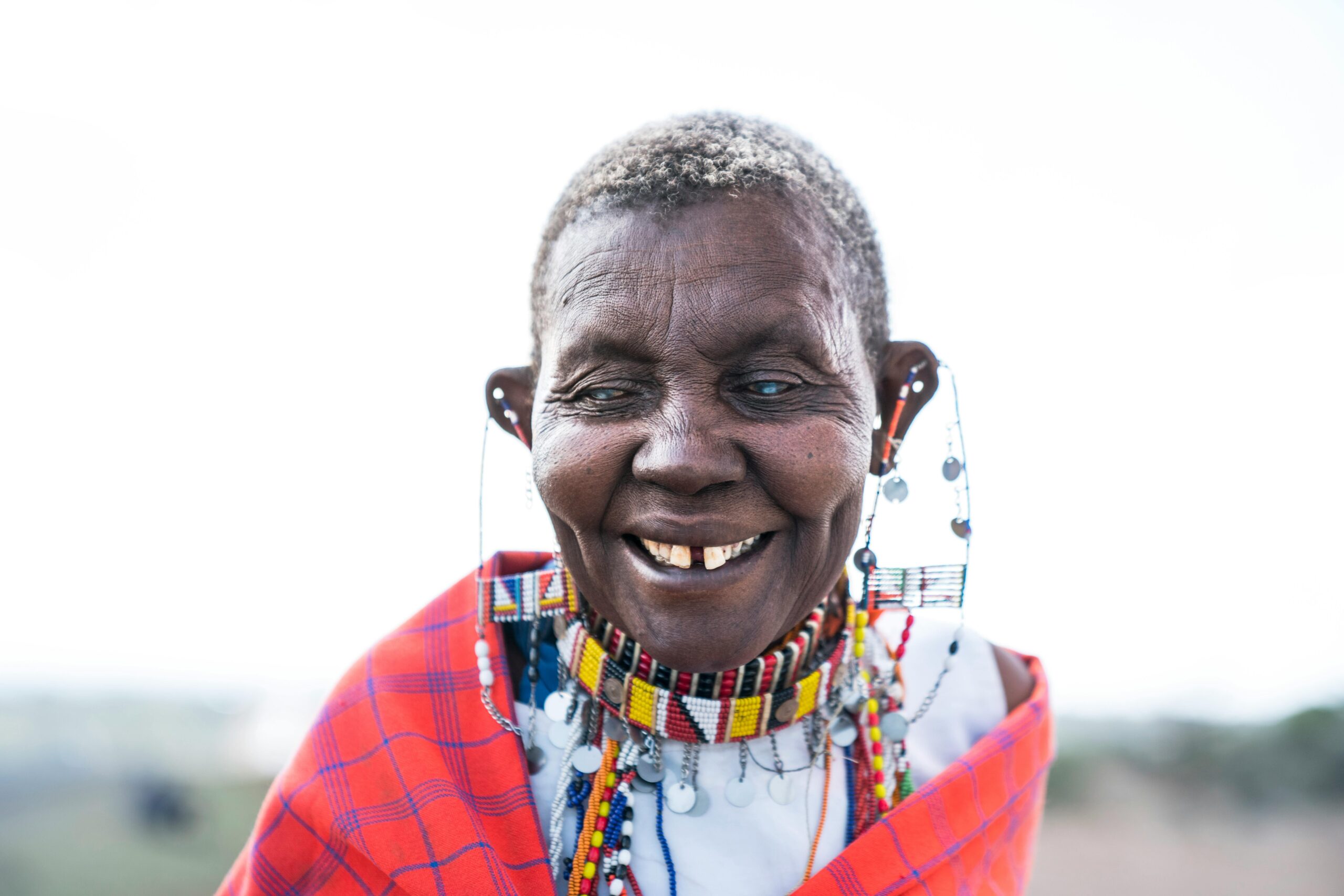 a blind old woman smiling